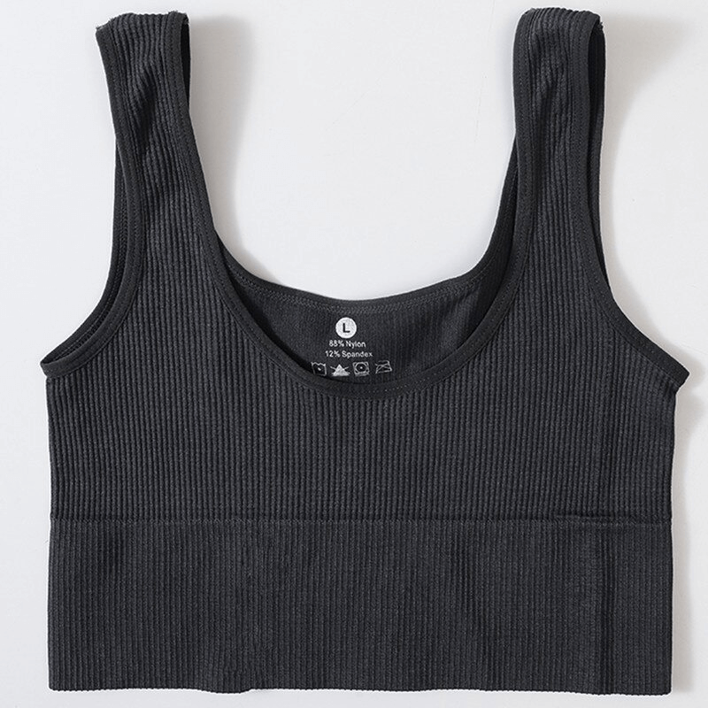 Black ribbed seamless tank top for women, perfect for sports and fitness; breathable backless design for yoga, gym, or dance.